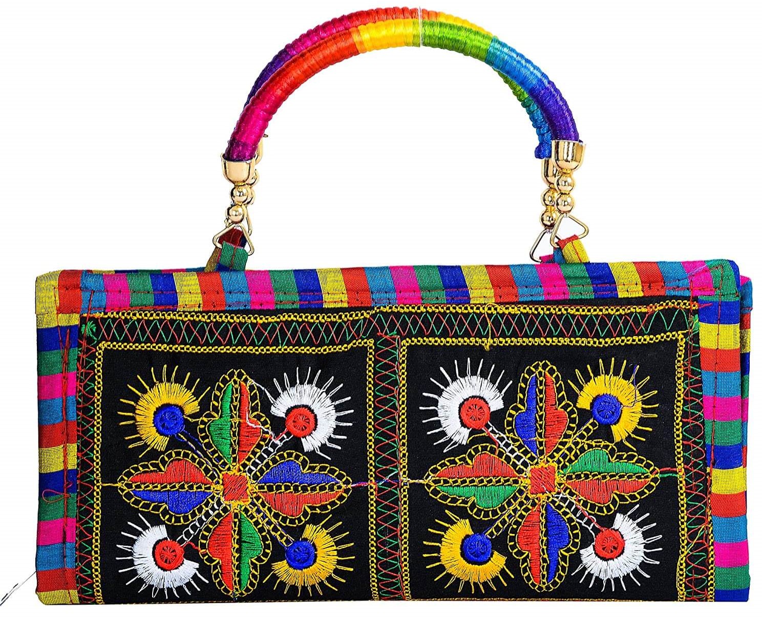 Rajasthani Clutch bag is a little handy purse with zipper. The rectangular shaped clutch has fancy embroidery on both sides.